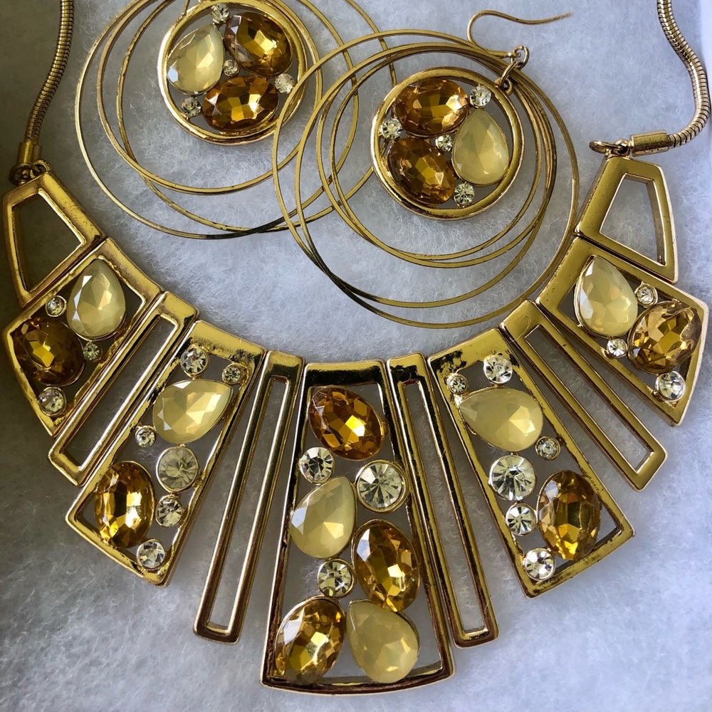 Gold color necklace and earrings.